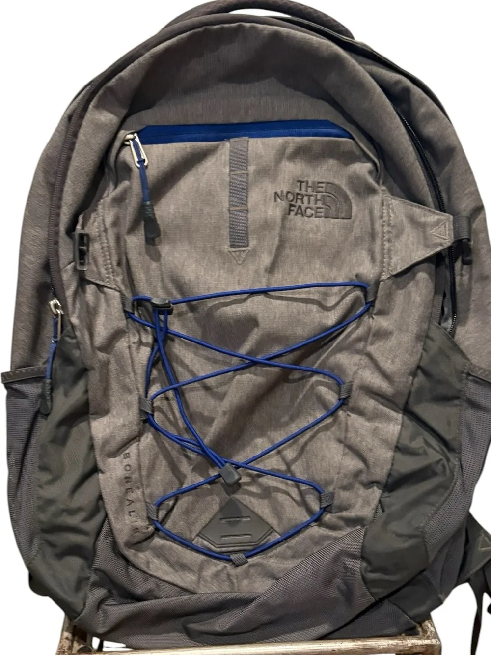 The North Face - Borealis Backpack with blue bungee cords.